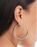 silver plated earrings with graduated skinny hoop detail