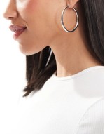 silver plated earrings with graduated skinny hoop detail